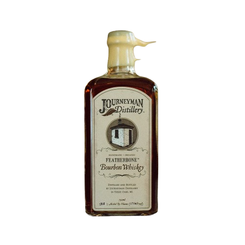 Bottle of Journeyman Distillery Featherbone Bourbon Whiskey on a white background
