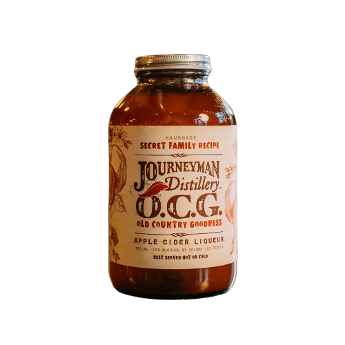 Bottle of Journeyman Distillery O.C.G. Apple Cider Liqueur on a white background